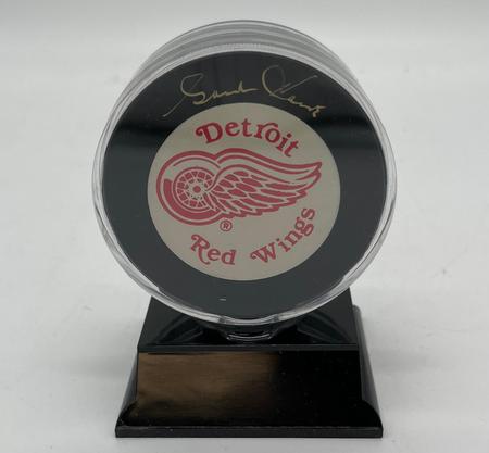 Gordie Howe autographed Red Wings Puck with Certificate of Authentication